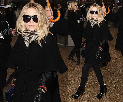 Mary-Kate Olsen at London Fashion Week Wearing Black Cape Coat and Blue Proenza Schouler Clutch