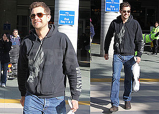 Photos of Joshua Jackson Arriving at the Vancouver Airport Wearing a Navy Sweatshirt and Jeans