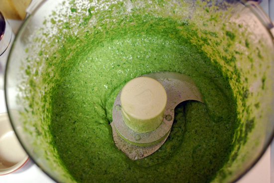 Blend all ingredients while adding in salt, pepper and oil. Then mix in Parmesan cheese.