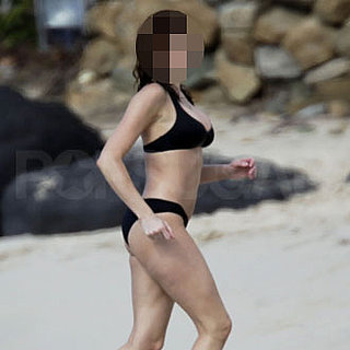 Guess Who's in a Black Bikini on the Beach? 