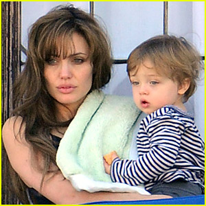 Angelina Jolie spends some quality time with Knox on the balcony of their hotel in Rome