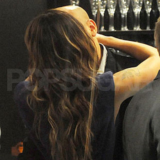 Guess Who's Making Out at a Hotel Bar?