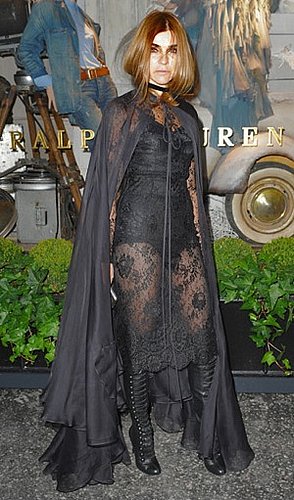 Vogue Paris Editor Carine Roitfeld Wears Black Lace and Cape