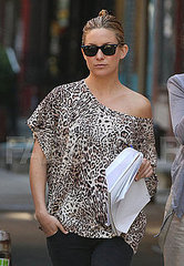 Kate Hudson in an Off-the-Shoulder Leopard Print Top Kate Hudson in an Off-the-Shoulder Leopard Print Top