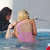 Guess Who's in a Hot Tub With Her Clothes On?