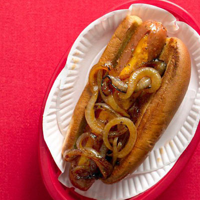 July Fourth Recipe For Cheese-Stuffed Hot Dogs with Spicy Onions