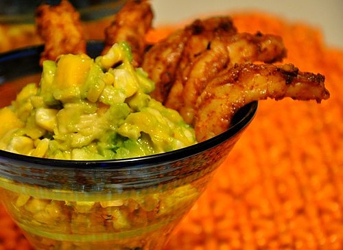 The spicy shrimp may burn, but the avocado, corn, and mango salsa cools things off in this tropical shrimp cocktail.
The spicy shrimp may burn, but the avocado, corn, and mango salsa cools things off in this tropical shrimp cocktail.