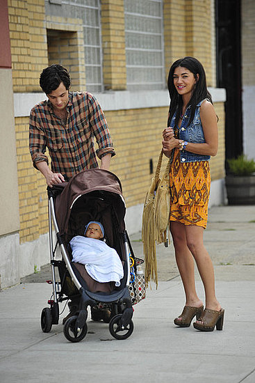 Jessica Szohr and Penn Badgley are left holding the baby on the set of