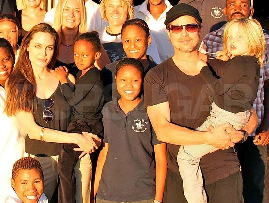 Angelina Jolie, Brad Pitt, Shiloh, and Zahara Pose With Their Christmas Hosts in Namibia! Angelina Jolie, Brad Pitt, Shiloh, and Zahara Pose With Their Christmas Hosts in Namibia!