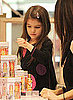 Pictures of Suri Cruise Trying on Lipstick in Vancouver