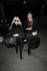 Pictures of Jessica Simpson and Eric Johnson Leaving London