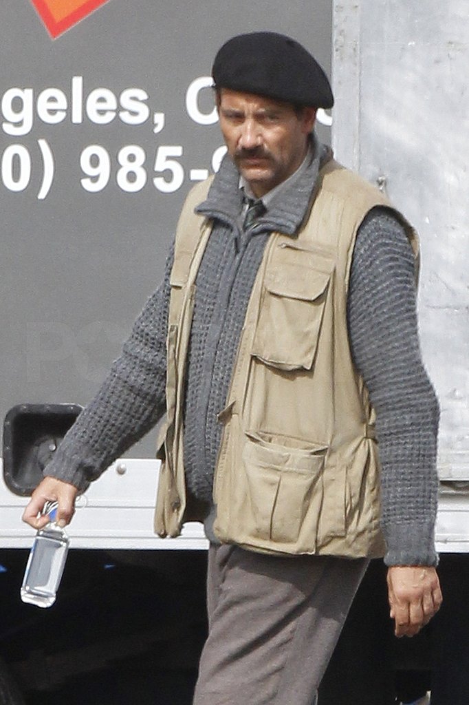 Clive Owen Manages to Pull Off the Tricky Mustache, Beret, and Vest Combo Clive Owen Manages to Pull Off the Tricky Mustache, Beret, and Vest Combo