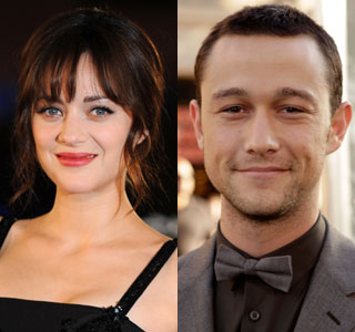 Marion Cotillard as Miranda Tate and Joseph Gordon-Levitt as Cop John Blake in The Dark Knight Rises