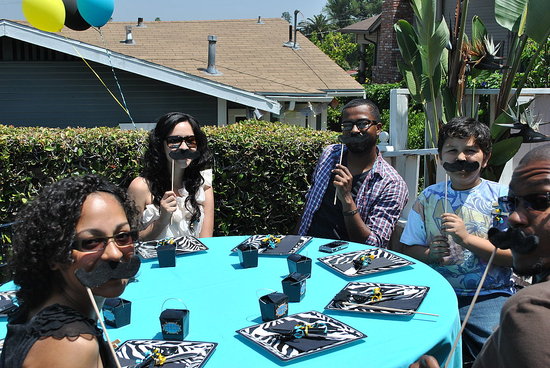 Guests using their moustaches