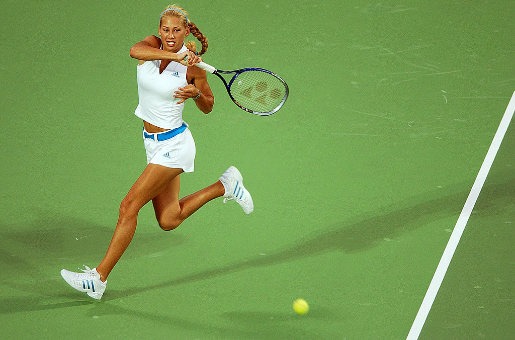 Anna Kournikova displayed her favorite designer brand and colors in an all Adidas tennis attire.
Anna Kournikova displayed her favorite designer brand and colors in an all Adidas tennis attire.