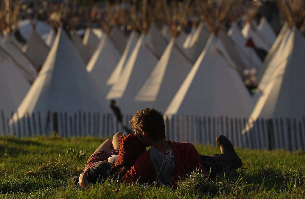 These lovebirds watched the sunset together on the grass at the Glastonbury festival.
These lovebirds watched the sunset together on the grass at the Glastonbury festival.