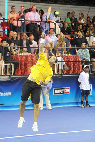Pete Sampras wore bold black and yellow at the DIRECTV Old School Challenge in New York City, August 2011.
Pete Sampras wore bold black and yellow at the DIRECTV Old School Challenge in New York City, August 2011.