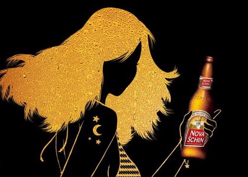 This artsy add shows a glowing woman drinking a beer, although they haven't managed to put her in something other than the predictable bikini.
This artsy add shows a glowing woman drinking a beer, although they haven't managed to put her in something other than the predictable bikini.