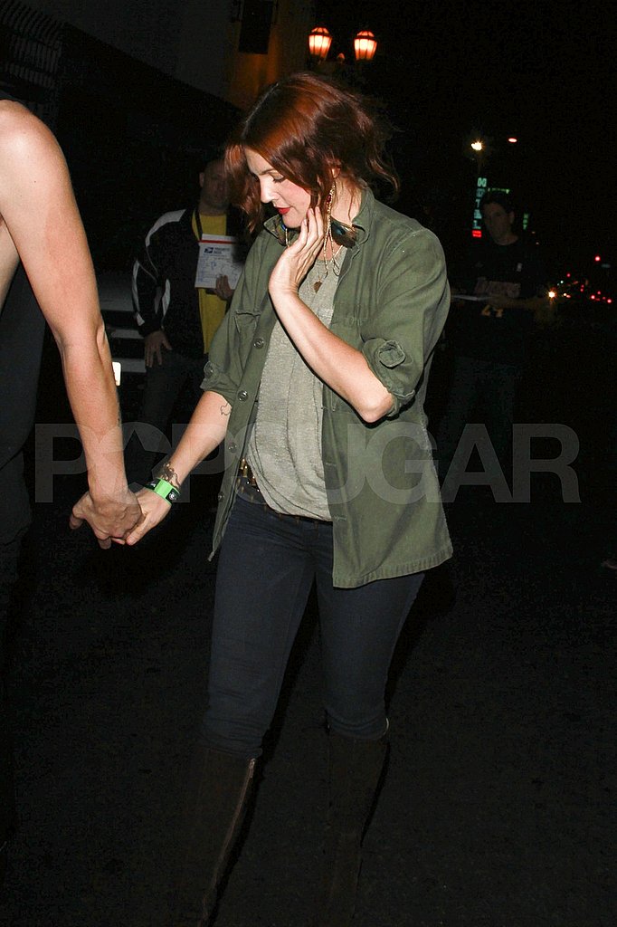 Drew Barrymore parties in green.
Drew Barrymore parties in green.