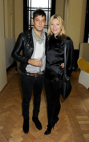 Kate Moss and Jamie Hince stuck close together while posing for photos after James Small's London Fashion Week show in September 2011.
Kate Moss and Jamie Hince stuck close together while posing for photos after James Small's London Fashion Week show in September 2011.