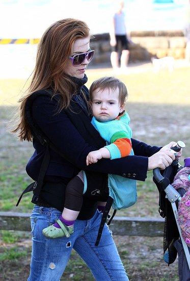 Elula Cohen was strapped to her mom Isla Fisher for a walk.
Elula Cohen was strapped to her mom Isla Fisher for a walk.