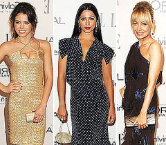 Camila Alves Holding Metallic Clutch