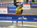 Masazumi Soejima of Japan Finishes First in the Wheelchair Division
