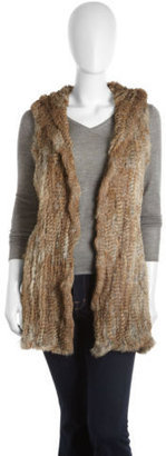 fur vest.