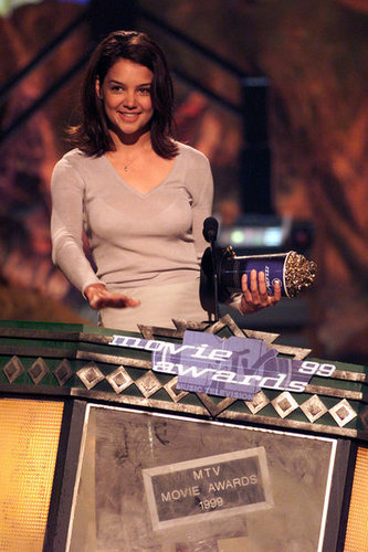 Katie Holmes shared a smile while accepting an award for her role in Disturbing Behavior at the MTV Movie Awards in June 1999.
Katie Holmes shared a smile while accepting an award for her role in Disturbing Behavior at the MTV Movie Awards in June 1999.