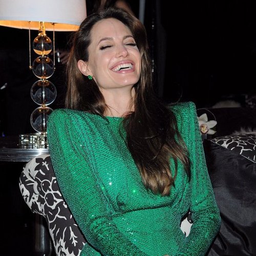 Angelina Jolie cracked herself up during the Sony afterparty in 2011.
Angelina Jolie cracked herself up during the Sony afterparty in 2011.