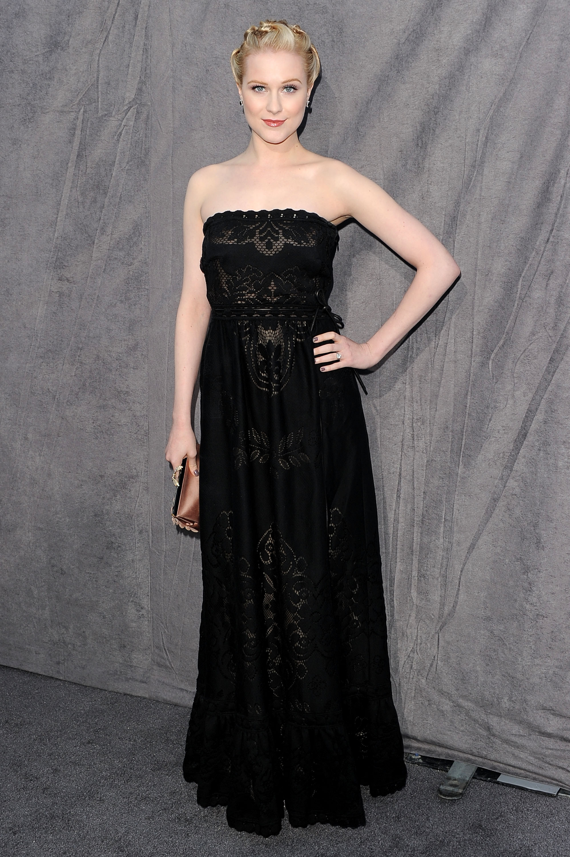 Evan Rachel Wood hit the gray carpet in a strapless black dress at the 2012 Critics' Choice Movie Awards. Evan Rachel Wood hit the gray carpet in a strapless black dress at the 2012 Critics' Choice Movie Awards.