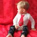 Favorite Like this item?  Add it to your favorites to revisit it later. Valentine's Day "Be Mine" Tie Onesie and Leg Warmers Set
