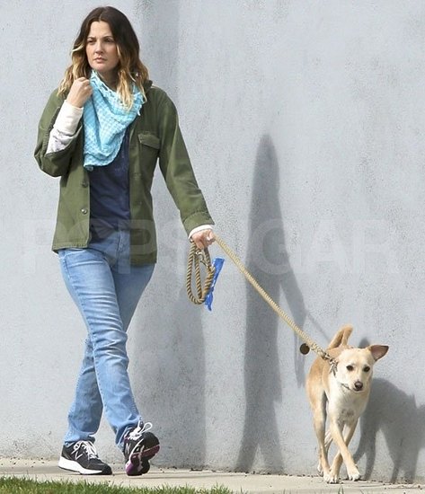 Drew Barrymore wore her engagement ring while walking her dog. Drew Barrymore wore her engagement ring while walking her dog.