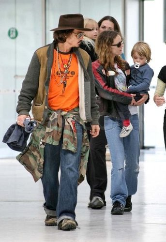Johnny and Vanessa arrived at the airport in Nice with their kids, Lily and Jack, during a May 2006 trip.
Johnny and Vanessa arrived at the airport in Nice with their kids, Lily and Jack, during a May 2006 trip.