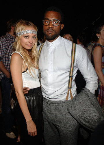 Kanye West, clad in suspenders and geek-chic glasses, posed with Nicole Richie at Marc Jacobs's September 2008 show.
Kanye West, clad in suspenders and geek-chic glasses, posed with Nicole Richie at Marc Jacobs's September 2008 show.