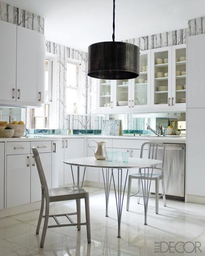 Peeking out from behind the cabinetry in stylist and editor Jackie Astier Upper East Side kitchen, the Woods wallpaper adds a fairy-tale touch to the modern look. See more of Astier's apartment in Elle Decor.
Peeking out from behind the cabinetry in stylist and editor Jackie Astier Upper East Side kitchen, the Woods wallpaper adds a fairy-tale touch to the modern look. See more of Astier's apartment in Elle Decor.