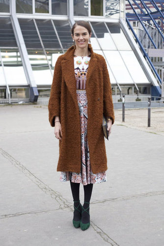 We love the juxtaposition of long bouclé coat against a pretty print and strappy heels.
We love the juxtaposition of long bouclé coat against a pretty print and strappy heels.