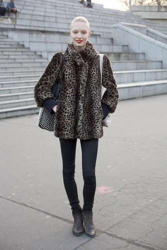 To keep your all-black getup dynamic, add leopard print into the mix via an accessory or topper.
To keep your all-black getup dynamic, add leopard print into the mix via an accessory or topper.