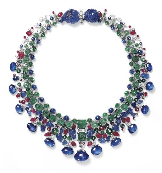 The jewels alluded to in the film are represented by the Tutti Frutti necklace, made to order for Daisy Fellowes, the daughter of the Duc Descaze and Isabella Singer (heiress to the Singer sewing machine fortune). A Parisian socialite who became Paris correspondent to Harper's Bazaar from 1933 to 1935, Fellowes's Tutti Frutti necklace was comprised of 13 sapphires, two leaf-shaped sapphires, and an array of emerald and ruby beads. This Tutti Frutti style became iconic to Cartier and was inspired by Jacques Cartier's trips to India.
The jewels alluded to in the film are represented by the Tutti Frutti necklace, made to order for Daisy Fellowes, the daughter of the Duc Descaze and Isabella Singer (heiress to the Singer sewing machine fortune). A Parisian socialite who became Paris correspondent to Harper's Bazaar from 1933 to 1935, Fellowes's Tutti Frutti necklace was comprised of 13 sapphires, two leaf-shaped sapphires, and an array of emerald and ruby beads. This Tutti Frutti style became iconic to Cartier and was inspired by Jacques Cartier's trips to India.