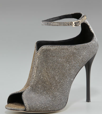 Dress up your Summer LBD with these sparkle-infused ankle-strap booties — we're guessing they'll make your legs look miles long.
B Brian Atwood sparkly ankle-strap booties ($350)
Dress up your Summer LBD with these sparkle-infused ankle-strap booties — we're guessing they'll make your legs look miles long.
B Brian Atwood sparkly ankle-strap booties ($350)