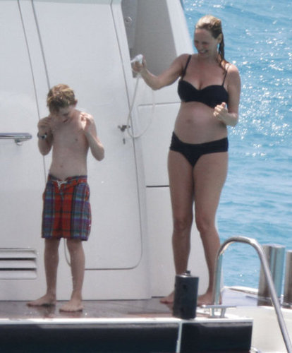 A 41-year-old Uma Thurman showed off her growing bump in a black bikini. She was expecting her third child, her first with her long-term partner Arpad Busson, a London-based financier.
A 41-year-old Uma Thurman showed off her growing bump in a black bikini. She was expecting her third child, her first with her long-term partner Arpad Busson, a London-based financier.
