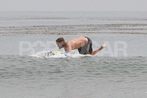 Robert Pattinson splashed in the ocean shirtless.
Robert Pattinson splashed in the ocean shirtless.
