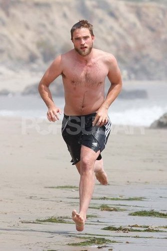 Robert Pattinson went running shirtless on the beach.
Robert Pattinson went running shirtless on the beach.