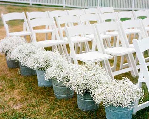 Who knew that tin buckets brimming with baby's breath could have such a big impact when paired with simple white chairs? Such an inexpensive but tasteful way to introduce florals to an aisle.
Source
Who knew that tin buckets brimming with baby's breath could have such a big impact when paired with simple white chairs? Such an inexpensive but tasteful way to introduce florals to an aisle.
Source