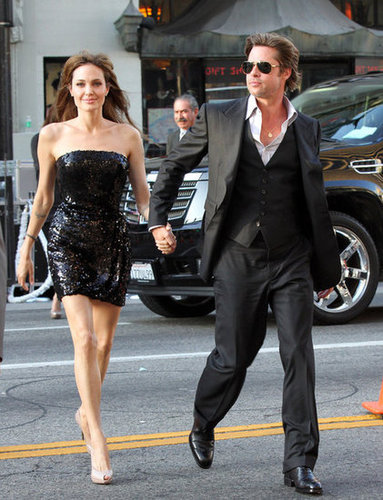 Brad Pitt held onto Angelina Jolie's hand arriving at her July 2010 LA premiere of Salt.
Brad Pitt held onto Angelina Jolie's hand arriving at her July 2010 LA premiere of Salt.