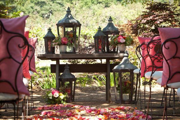 Bypass the standard arch routine, and try a unique table setup instead. Use lanterns, flowers, boxes, suitcases — whatever seems to fit in with the rest of your wedding decor.
Photo by BLR Life Photography & Cinema via Style Me Pretty
Bypass the standard arch routine, and try a unique table setup instead. Use lanterns, flowers, boxes, suitcases — whatever seems to fit in with the rest of your wedding decor.
Photo by BLR Life Photography & Cinema via Style Me Pretty