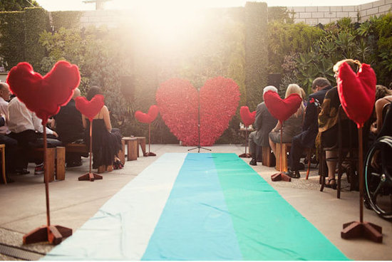 If you have a specific shape or logo that's running throughout your wedding design, consider creating a large floral version for your ceremony backdrop.
Source
If you have a specific shape or logo that's running throughout your wedding design, consider creating a large floral version for your ceremony backdrop.
Source