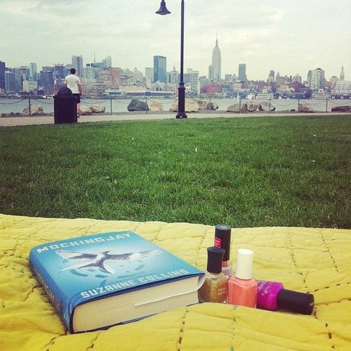 Glitterandgrace finishes up The Hunger Games trilogy during a "lazy Sunday at the park."
Glitterandgrace finishes up The Hunger Games trilogy during a "lazy Sunday at the park."