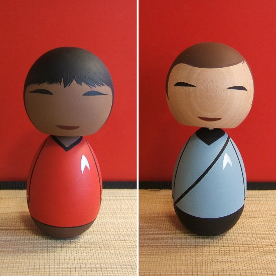 These round custom Star Trek Kokeshi dolls ($25) are contemporary and clean in their design and detailing. While they probably aren't intended to top a cake, they would look great at a modern, futuristic wedding.
These round custom Star Trek Kokeshi dolls ($25) are contemporary and clean in their design and detailing. While they probably aren't intended to top a cake, they would look great at a modern, futuristic wedding.