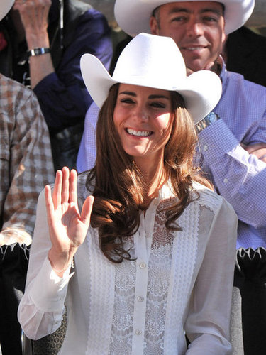 Proving that rodeo wares can be sweet too, Kate wore a lacy semisheer white Temperley London button-up with a white cowboy hat and dark-wash jeans for the Calgary Stampede Parade.
Proving that rodeo wares can be sweet too, Kate wore a lacy semisheer white Temperley London button-up with a white cowboy hat and dark-wash jeans for the Calgary Stampede Parade.